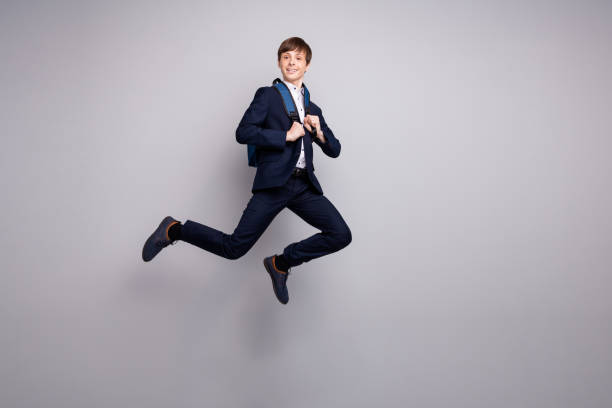 istock Full length body size view photo cute imposing guy want get knowledge move dressed white shirt black jackets pants trousers isolated grey background 1159804477