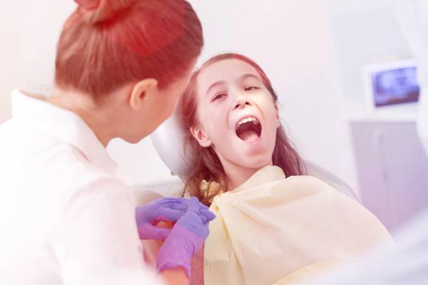 istock Medical personel (doctors, nurses and dentists) during different procedures with patients. 1159805216