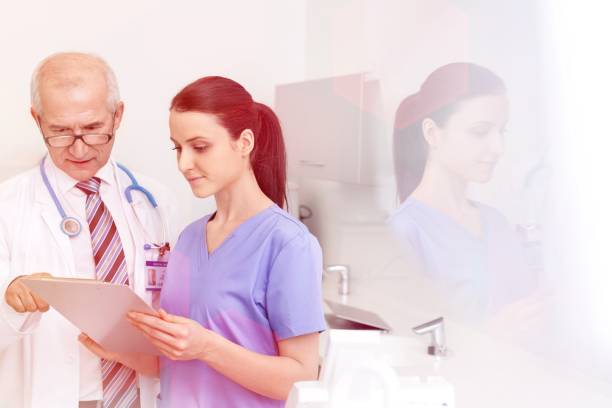 istock Medical personel (doctors, nurses and dentists) during different procedures with patients. 1159805374