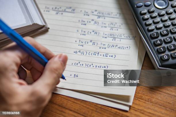 Math Left Hand A Lefthanded Person Solving Math Problem Stock Photo - Download Image ...
