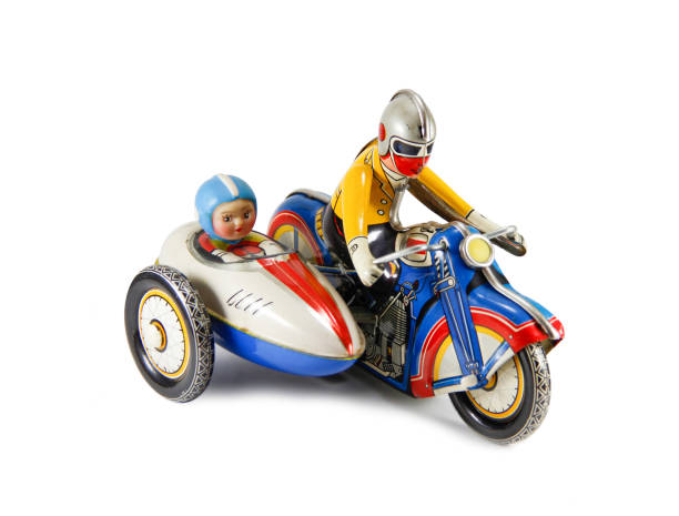 Motorcycle clockwork tin toy. stock photo