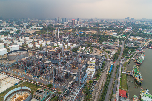 Aerial view of Oil refinery and gas industry in Petrochemical plant at twilight