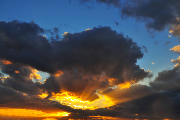 istock Storm clouds in a colorful sunset 1159809972