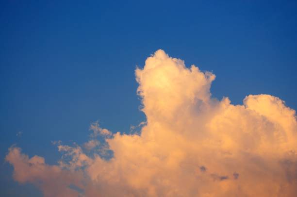 istock Storm clouds in a colorful sunset 1159810169