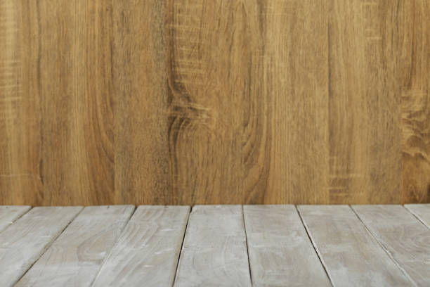 istock Empty top wooden surface table and wood wall background 1159810192