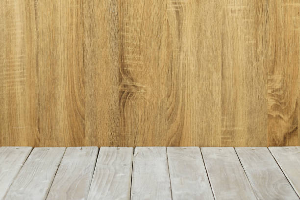 istock Empty top wooden surface table and wood wall background 1159810209