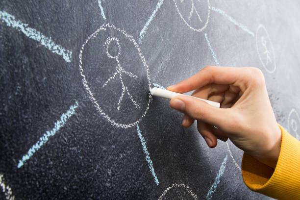 istock hand drawing social or social media network scheme 1159811228