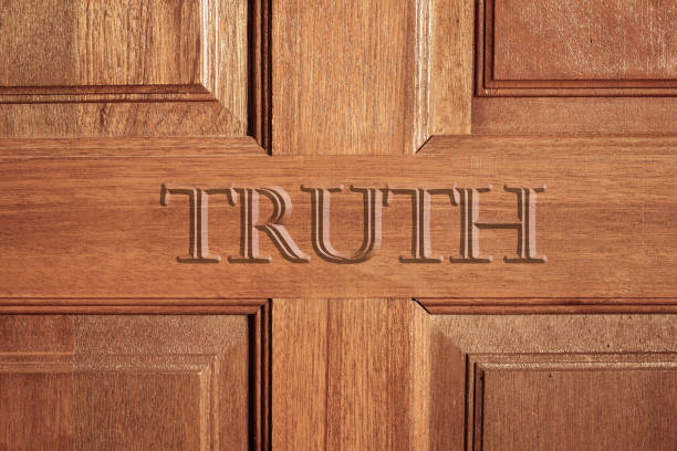 istock Truth word engraved on wooden door 1159811771