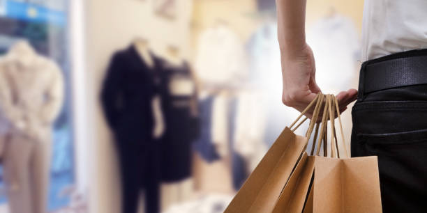 istock hand-held shopping bags, shopping mall 1159814101