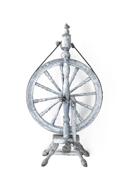 istock Old fashioned wooden spindle , spinning wheel isolated on white background 1159815934