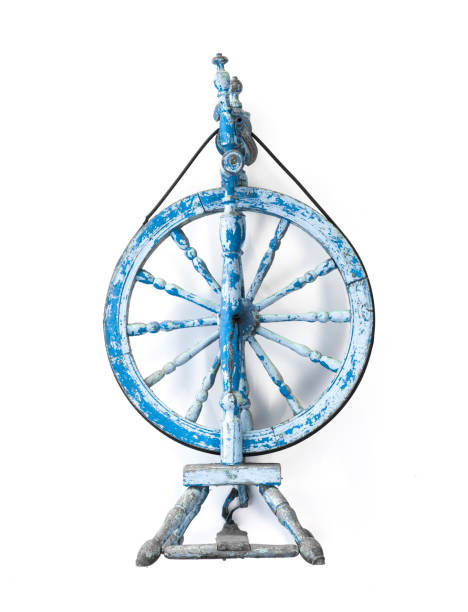 istock Old fashioned wooden spindle , spinning wheel isolated on white background 1159815941