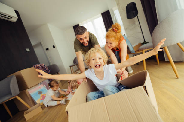 istock Positive happy man pushing the carton box 1159816754
