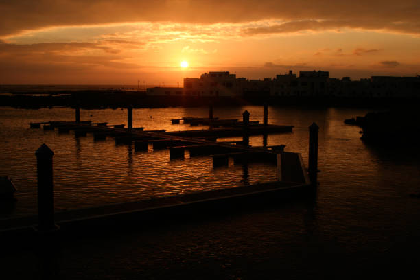 istock Sunrise at Orzola harbor 1159816862