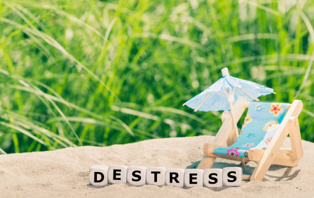 istock Dice placed next to a beach chair form the word 