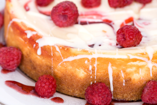 Closeup of raspberry cheesecake.