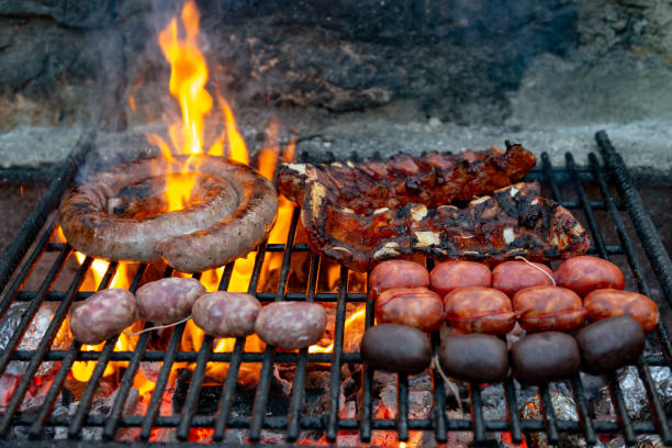 Meat and sausages cooking on a bbq