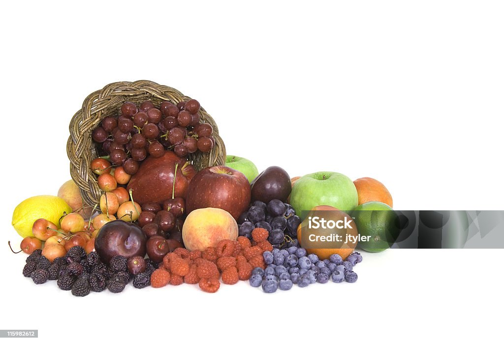 Cornucopia of Fruit A cornucopia of fruits and berries. Apple - Fruit Stock Photo
