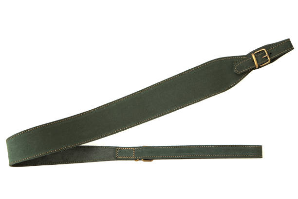 Green leather shoulder strap for a gun isolated on white background