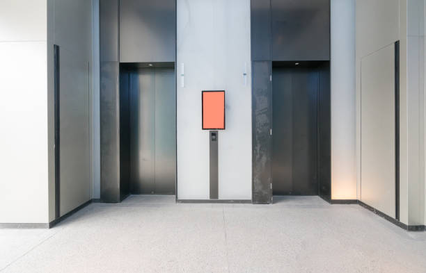 The elevator entrance is in the shopping mall