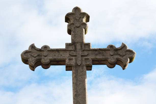 Old cross on grave in Porto seen on cemetery Cemitério de Agramonte