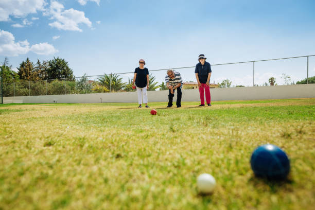 High Angle View Of Petanque Balls On Field
