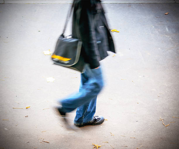 istock urban man at autumn in motion 1159830207