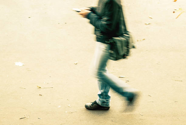 istock man with his phone in blurry motion 1159832786
