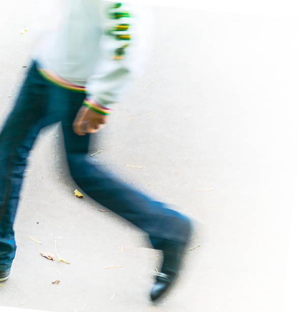 istock urban man at autumn in motion 1159833396