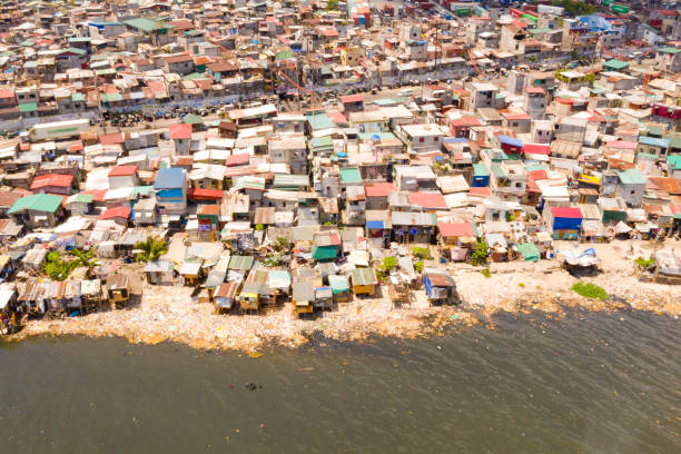istock Slums in Manila, a top view. Sea pollution by household waste 1159837270