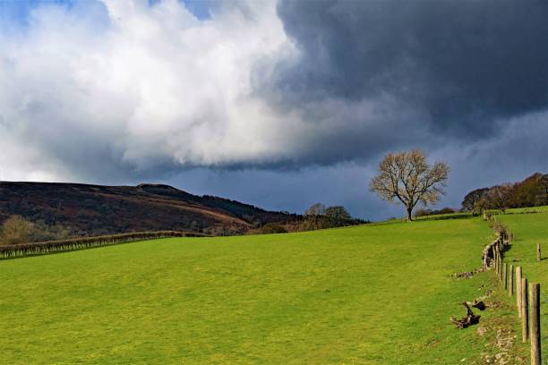 istock Dark clouds gather across the walk to Bamford Edge, Derbyshire 1159837757