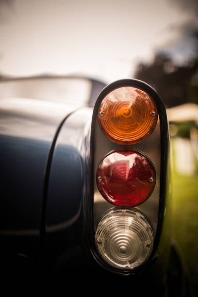 istock Red tail light of a classical vintage car 1159838858