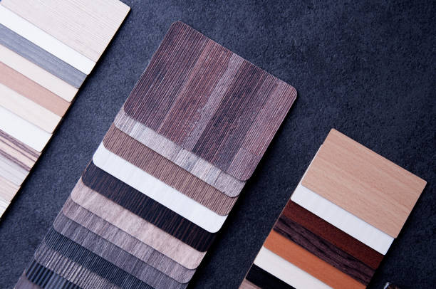 istock Construction Design. Interior Material Design concept. Wood texture floor Samples of laminate and vinyl floor tile. 1159840071
