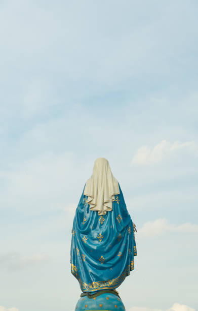 istock Our lady, The blessed Virgin Mary on blue sky background. 1159844267