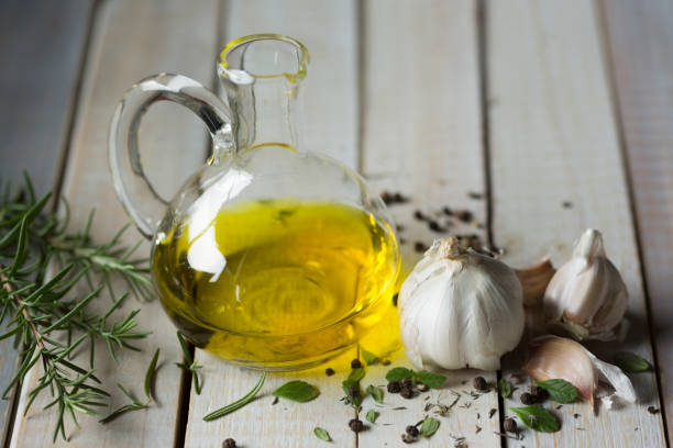 istock Olive oil, oregano and garlic. 1159846933