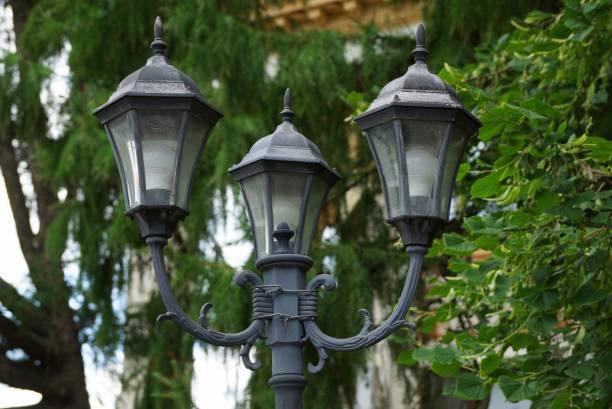 istock ancient street lamp in the park 1159846936