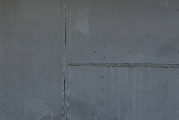 istock metal texture of iron wall with seams 1159847112
