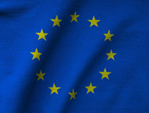 la bandiera dell'ue stampata su un tessuto a maglia jersey testurizzato - european union flag european community photography textured effect foto e immagini stock