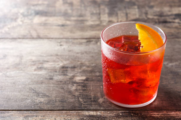 istock Negroni cocktail with piece of orange 1159850080