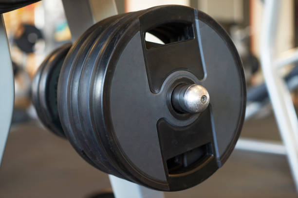 istock Sports equipment dumbbells in the gym 1159851663