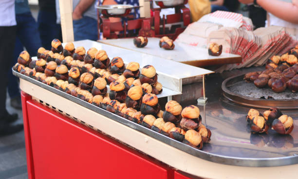 istock Traditional turkish fast food - roasted chestnuts 1159851815