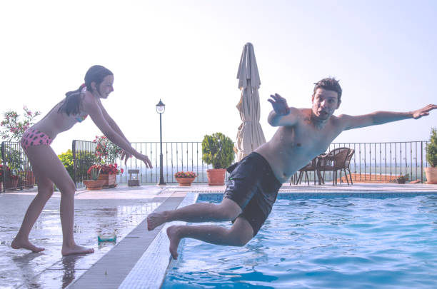 istock Don't push me.Crazy Jump in to a Pool 1159853099