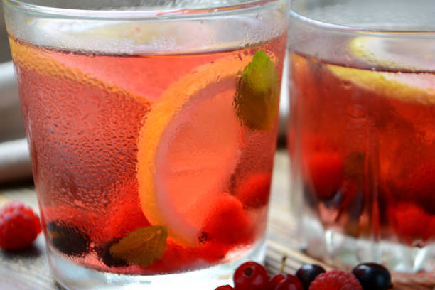 istock Cold berry lemonade in glasses Summer refreshing drink Close up 1159854224