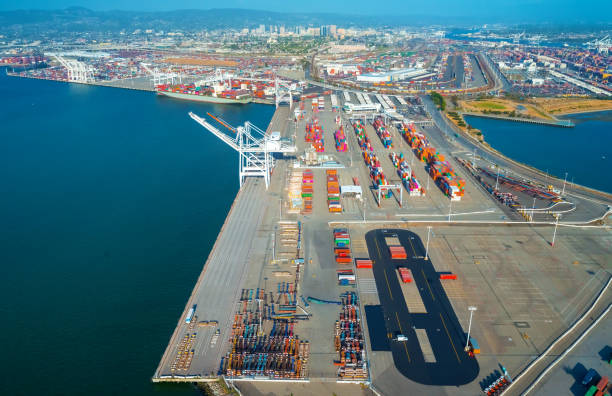 istock Oakland Harbor port terminal with shipping containers 1159855558