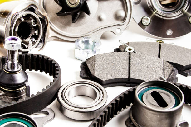 istock Auto parts background. Hub, pump, brake pads, filter, timing belt, rollers, constant velocity joints, thermostat and other on white background 1159858152