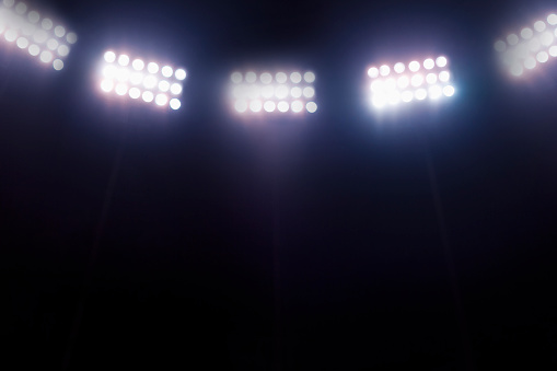 Vista de las luces del estadio por la noche photo