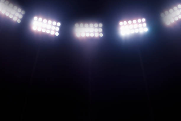 View of stadium lights at night stock photo
