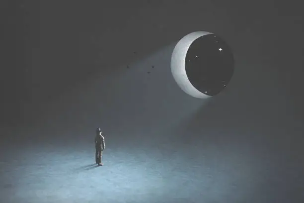 Photo of dream and fantasy, man observing the moon in the night that is a hole in the blue dark sky, surreal concept