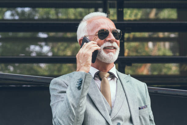 istock Senior businessman using smart phone 1159864019