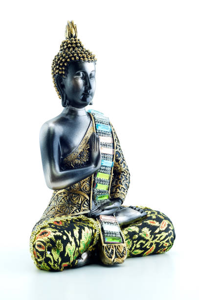 istock Portrait of a Buddha statue isolated on white background 1159867488