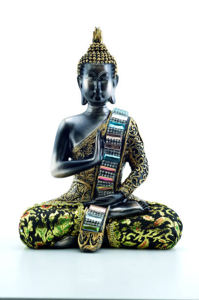istock Portrait of a Buddha statue isolated on white background 1159867498